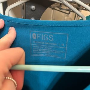 Figs. Ocean blue scrubs. Great condition. Worn only a few times.